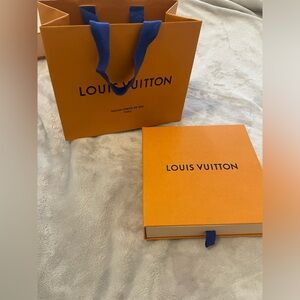 Louis Vuitton Orange Bag with Blue Handles